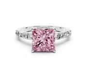 Fancy Pink Princess Cut Diamond Solitaire Set in White gold with Side Baguettes and Channel Set Band