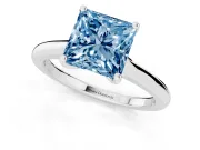 Fancy Blue Princess Cut Diamond Solitaire Ring Set in White gold with Cathedral Band and Prong Setting