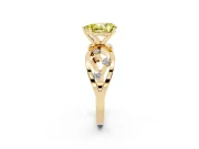 Fancy Yellow Pear Cut Diamond Solitaire Ring Set in Yellow gold with Side Stones on Criss-Cross Band and Prong Setting