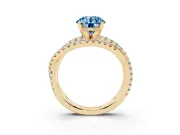 Fancy Blue Round Cut Diamond Solitaire Twist Band Ring Set in Yellow gold with Pavé Setting and Prong Head