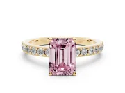 Fancy Pink Emerald Cut Diamond Solitaire Set in Yellow gold with Round Pavé Band and Prong Setting