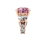 Fancy Pink Three-Stone Round Cut Diamond Pavé Band Ring Set in Rose gold with Prong-Set Trio
