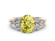Fancy Yellow Oval Cut Diamond Cluster Ring Set in Rose gold with Round Accent Stones and Prong Setting on a Plain Band