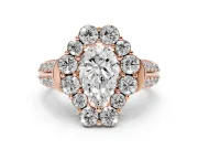 Pear Cut Diamond Halo Engagement Ring Set in Rose gold with Split Shank and Prong Setting