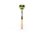Fancy Green Princess Cut Diamond Solitaire Set in Yellow gold with Side Baguettes and Channel Set Band