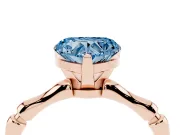 Fancy Blue Heart Cut Diamond Solitaire Ring Set in Rose gold with Bamboo Band and Prong Setting