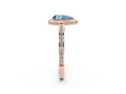 Fancy Blue Pear Cut Diamond Halo Pavé Split Shank Ring Set in Rose gold with Prong Setting