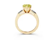 Fancy Yellow Heart Cut Diamond Solitaire Ring Set in Yellow gold with Tapered Baguette Side Stones and Prong Setting
