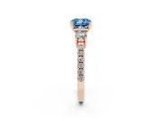Fancy Blue Three-Stone Cushion Cut Diamond Pavé Band Ring Set in Rose gold with Prong Setting