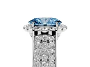 Fancy Blue Oval Cut Diamond Halo Ring Set in White gold with Pavé Band and Raised Center Setting
