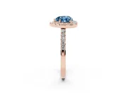 Fancy Blue Heart Cut Diamond Halo Pavé Solitaire Ring Set in Rose gold with Prong-Set Center Stone