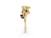 Fancy Yellow Pear Cut Diamond Solitaire Twist Engagement Ring Set in Yellow gold with Pavé Leaf Accents