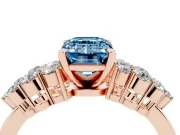 Fancy Blue Emerald Cut Diamond Cluster Engagement Ring Set in Rose gold with Pavé Band and Prong Setting