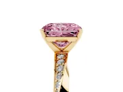 Fancy Pink Radiant Cut Diamond Engagement Ring Set in Yellow gold with Side Stone Accents and Prong Setting