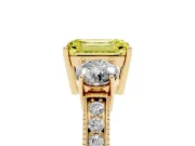 Fancy Yellow Emerald Cut Diamond Three-Stone Ring Set in Yellow gold with Round Side Stones and Pavé Band