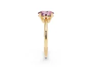 Fancy Pink Oval Cut Diamond Solitaire Ring Set in Yellow gold with Prong Setting on a Plain Round Band
