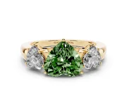 Fancy Green Heart Cut Diamond Three-Stone Ring Set in Yellow gold with Bold Center and Classic Band