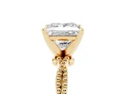 Princess Cut Diamond Solitaire Ring Set in Yellow gold with Twisted Band and Bead Prong Setting