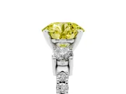Fancy Yellow Three-Stone Round Cut Diamond Pavé Band Ring Set in Platinum with Prong Setting