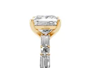 Princess Cut Diamond Solitaire Set in Yellow gold with Side Baguettes and Channel Set Band
