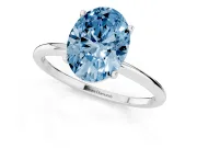 Fancy Blue Oval Cut Diamond Solitaire Engagement Ring Set in Silver with Thin Band and Prong Setting