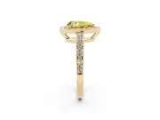 Fancy Yellow Pear Cut Diamond Halo Pavé Engagement Ring Set in Yellow gold with Bezel Setting