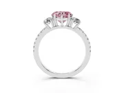 Fancy Pink Heart Cut Diamond Three-Stone Ring Set in Platinum with Pavé Band and Graduated Sides