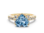 Heart-Shaped Side Stone Engagement Ring Setting for a Fancy Blue Lab-Grown Diamond | Pave Band | Yellow Gold