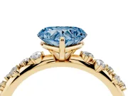 Fancy Blue Heart Cut Diamond Cluster Solitaire Ring Set in Yellow gold with Prong Setting