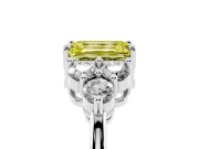 Fancy Yellow Emerald Cut Diamond Solitaire Ring Set in Silver with Cluster Accents on Each Side
