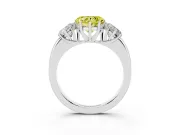 Fancy Yellow Heart Cut Diamond Three-Stone Ring Set in Platinum with Bold Center and Classic Band