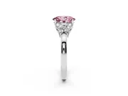 Fancy Pink Oval Cut Diamond Solitaire Floral Ring Set in Platinum with Marquise Petals and Prong Setting