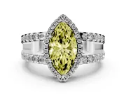 Fancy Yellow Marquise Cut Diamond Halo Ring Set in White gold with Pavé Split Shank and Prong Setting