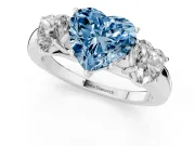 Fancy Blue Heart Cut Diamond Three-Stone Ring Set in Platinum with Bold Center and Classic Band