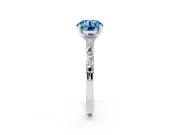 Fancy Blue Round Cut Diamond Solitaire Set in Silver with Side Baguettes and Channel Set Band