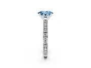 Fancy Blue Oval Cut Diamond Solitaire Ring Set in Silver with Slim Pavé Band and Prong Setting
