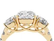 Cushion Cut Diamond Three-Stone Ring Set in Yellow gold with Pavé Band
