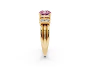 Fancy Pink Three-Stone Cushion Cut Diamond Channel Set Ring Set in Yellow gold with Bar Prongs