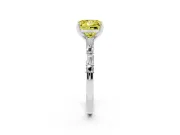 Fancy Yellow Princess Cut Diamond Solitaire Set in White gold with Side Baguettes and Channel Set Band
