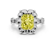 Fancy Yellow Radiant Cut Diamond Floral Halo Ring Set in White gold with Shared Prong Band