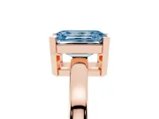 Fancy Blue Emerald Cut Diamond Solitaire Ring Set in Rose gold with Prong Head and Smooth Polished Band