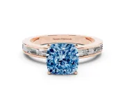 Fancy Blue Cushion Cut Diamond Solitaire Ring Set in Rose gold with Channel-Set Baguette Band and Prong Setting