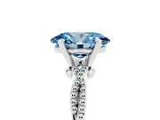 Fancy Blue Oval Cut Diamond Solitaire Ring Set in White gold with Twisted Band and Bead Prong Setting