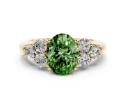 Fancy Green Oval Cut Diamond Cluster Ring Set in Yellow gold with Round Accent Stones and Prong Setting on a Plain Band