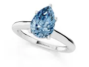 Fancy Blue Pear Cut Diamond Solitaire Ring Set in White gold with Cathedral Band and Prong Setting