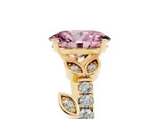 Fancy Pink Oval Cut Diamond Solitaire Leaf-Inspired Ring Set in Yellow gold with Pavé Band and Prong Setting