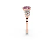 Fancy Pink Heart Cut Diamond Cluster Engagement Ring Set in Rose gold with Pavé Band and Prong Setting