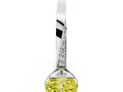 Fancy Yellow Radiant Cut Diamond Engagement Ring Set in Platinum with Side Stone Accents and Prong Setting
