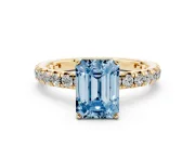 Fancy Blue Emerald Cut Diamond Pavé Solitaire Ring Set in Yellow gold with Round Band and Prong Setting