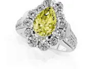 Fancy Yellow Pear Cut Diamond Halo Engagement Ring Set in Platinum with Split Shank and Prong Setting
